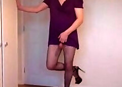 Purple minidress, no bra and fishnets