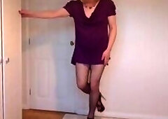 Purple minidress, no bra and fishnets