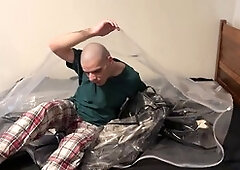 Bound in my PVC mask and latex gear, ready for some serious breath play