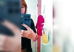 Curvy Redhead Mirror Selfie: Lifts Shirt to Show Biggest Natural Boobs in Washroom