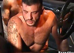 Muscle hunks suck and fuck in car in parking