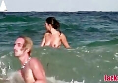 Slim chick with small tits is naked on the beach and in the mood to be naughty