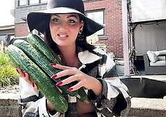 Despairing lascivious housewife is out in her garden and gets super aroused when this babe finds big cucumbers in her garden whilst her spouse isn’t