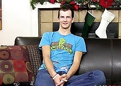 Twink strips after an interview and masturbates with a dildo