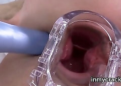 Stunning beauty is flaunting her stretched tight vagina in close-up