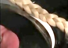 Angel-in-Latex sucking cock and eating sperm