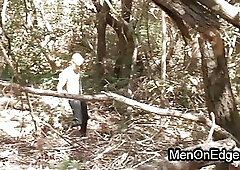 Tied to a cross gay gets dick jerked off and vibed outdoor