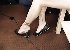 I start sitting, some legs crossed dangles, toe swinging, and then shoe drops and sliding back into 'em. I too stand flex my calves point my toes