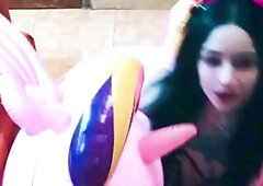Cosplay cutie has pleasure with a pink inflatable unicorn