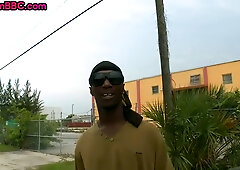 Black parolee riding a white cock