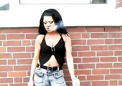 Busty Brunette Smoking