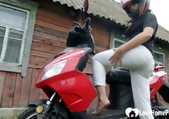 Biker chick masturbates on her red motorcycle