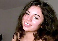 Busty curly brunette with big boobs fucks on couch