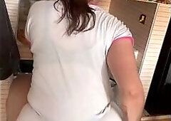 Spying on her in pajamas during the time that this babe cooks in a belt and underware