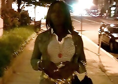 Ebony shemale exposes her uncut black shecock and big boobs