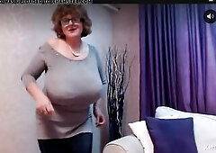 Older breasty camgirl dances and shows breasts