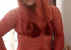 Red Sissy plays with her clit and cum