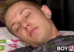 Twink wanking then slides glass dildo deep in his ass