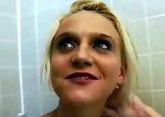 Denim shorts hit the floor and the 2 of 'em climb onto the leopard print sheets. The platinum blond swings a leg over her brunette hair girlfrien