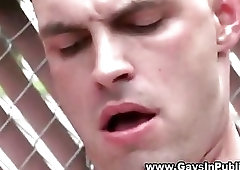 Bald gay guy gets cumshot load to the face in a outdoor area