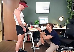 Horny office manager Carter Woods tries Trevor Brooks big footlong