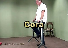 Cora booty whip in a predicament servitude position.