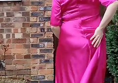Super Hot sissy crossdresser outdoors in total length steaming rosy satin