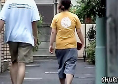 Street sharking with woman in jeans shorts