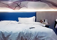 Cute amateur asian web cam girl playing with her toy