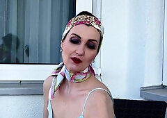 Smokin' a cigarette on the balcony in a silk negligee. Legs, lots of mules, marabou mules, legs and feet show. Barefoot, Hot Red Painted Toenails