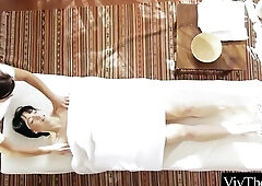 Beautiful masseuse makes her cute client climax by fingering her