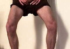 wooly man in sneakers and white socks faps off and showcases his gams
