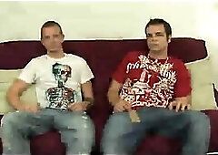 Double wanking on the sofa