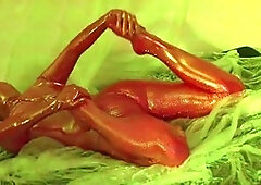 Sultry ginger-haired milf poses for a steamy photoshoot by the lake