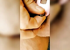 Locked Shy Racoon is banging her urethra with iron bullet