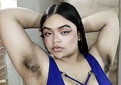 Celeste proudly shows off her recent blue costume and shoes. This babe displays her lushly hirsute armpits and legs. This babe suggests a brief glimps