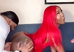 Redhead tranny takes two black cocks