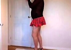 Naughtry short skirt, high heels and pantyhose