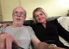 A Mature Woman Surrounded By Friends