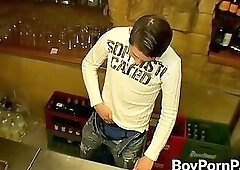 Bartender takes his cock and masturbates behind the counter