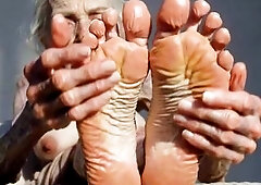 Excited granny oils her feet and indulges in a lengthy, slippery foot massage. What begins as effortless foot care quickly turns into pure joy as that