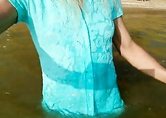 Alexa Cosmic transgirl swimming in the sea 1st time in teal combi suit
