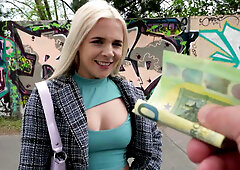 Ellie Shou is getting picked up outdoors