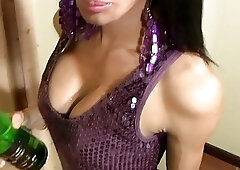 Skinny Asian ladyboy shoves a champagne bottle up her ass