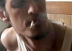 Smoking musician breaks for a quick yank