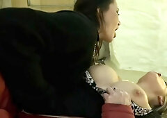 Blonde and brunette lesbians munch their asses