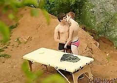 Massaged twink barebacks and gets cum