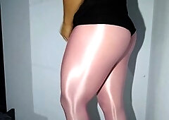 Shiny leggings on a stunning Latina shemale with a sexy ass