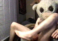 Lean fur covered white guy in a goat mask strokes off in a tabouret