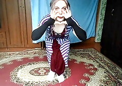 Gorgeous young femboy with a plump rear explores sensual moments at home in a cute outfit